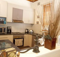 Anderl's Beach Cottage - Cruises Travel