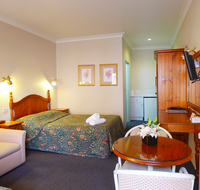 New England Motor Inn - Tourism Guide