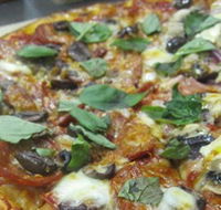 Mezzadellas Woodfired Pizza and Tapas - Travel Agents