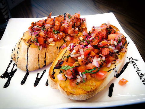 Accordion Cafe & Restaurant - Tourism Guide 0