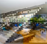 Maggies Beachfront Apt. 12 - Travel Search