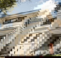 T  M HOUSE