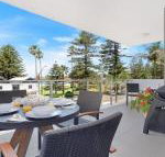 Bathers at the Beach across from Surf Beach - Travel Agents