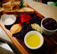 Q Manhattans Restaurant  Bar - Travel Agents