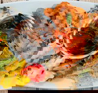 Mumm's on the Myall - Travel Agents