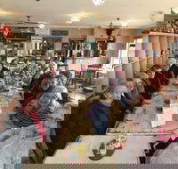 Purple People Feeder Cafe - Cruises Travel