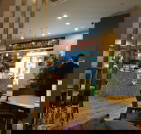 Village Coffee Shop - Travel Agents