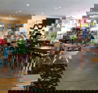 Mid-Century Cafe and Collectables - Travel Search