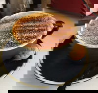 Little Growling Cafe - Travel Search