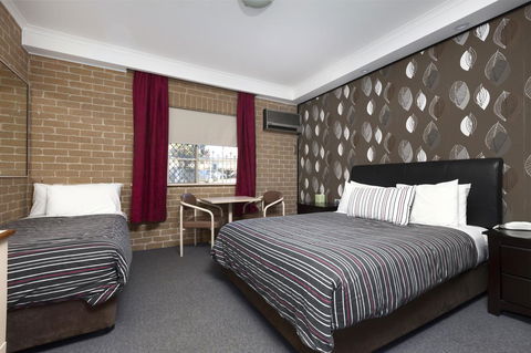 Grand Manor Motor Inn - Cruises Travel 8
