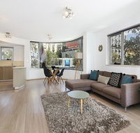 Lower Bridge and Sails - Executive 2BR Darlinghurst Apartment with Balcony and Rooftop Views - Cruises Travel