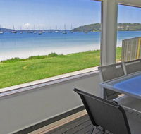 Casa Martins' 219 Foreshore Drive - Absolute Waterfront House - Cruises Travel
