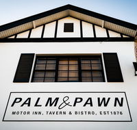 Palm and Pawn Motor Inn