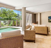 The Stanwell Beach Glass House - beach  pool - Travel Agents