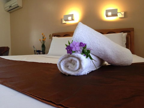 Novena Palms Motel - Cruises Travel 15