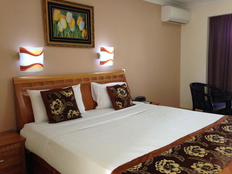 Novena Palms Motel - Cruises Travel 10