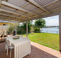 Lowset home on the canal - Dolphin Dr Bongaree - Tourism Guide