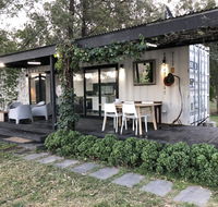Absolute riverfront shipping container cabin - Cruises Travel