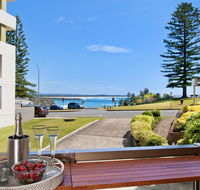 Beauty at the Beach - modern beachfront apartment - Travel Agents
