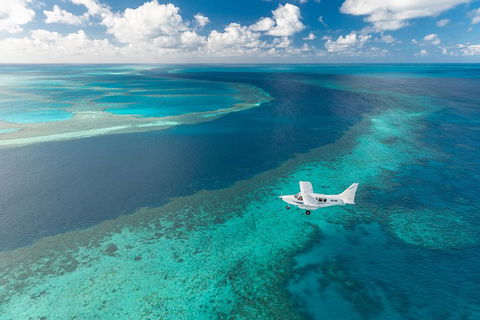 Great Barrier Reef Scenic Flight And Ocean Rafting Whitehaven Beach Day Trip - Travel Search 3